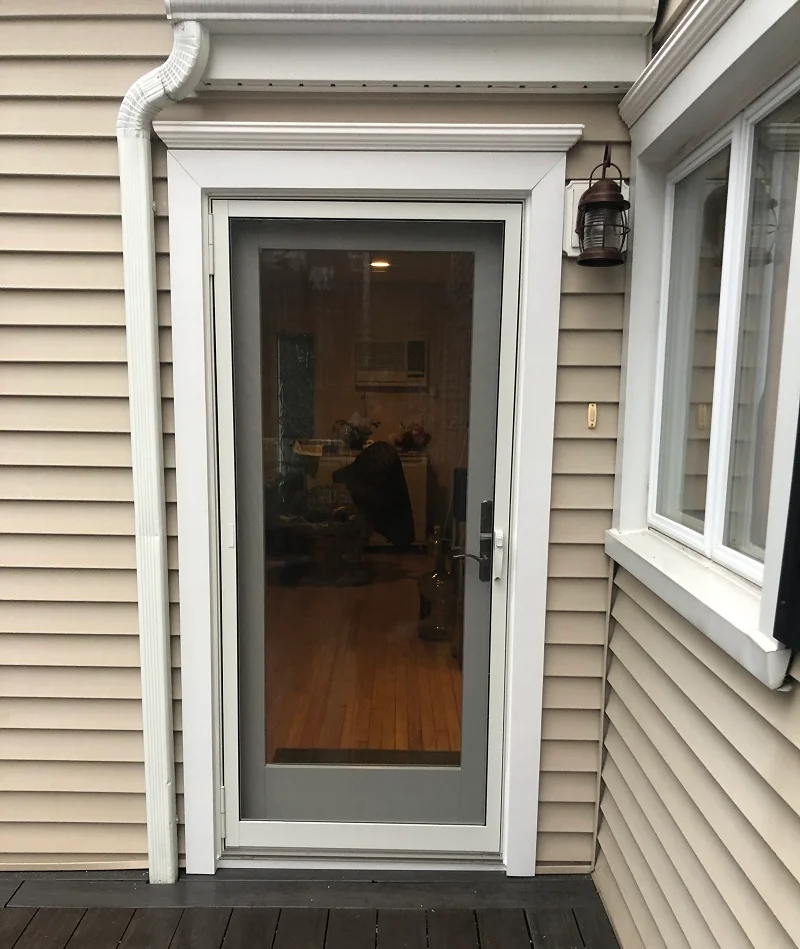 A Series hinged patio door with exterior crown molding